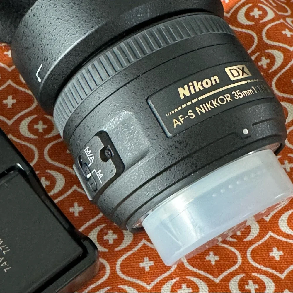 Nikon D3100 with two lenses and carry case. EUC